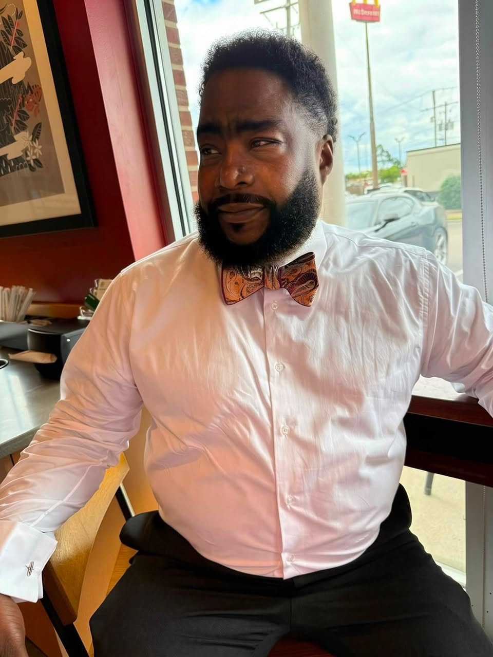 Teresa White's recent Facebook post featuring a man wearing a bow tie