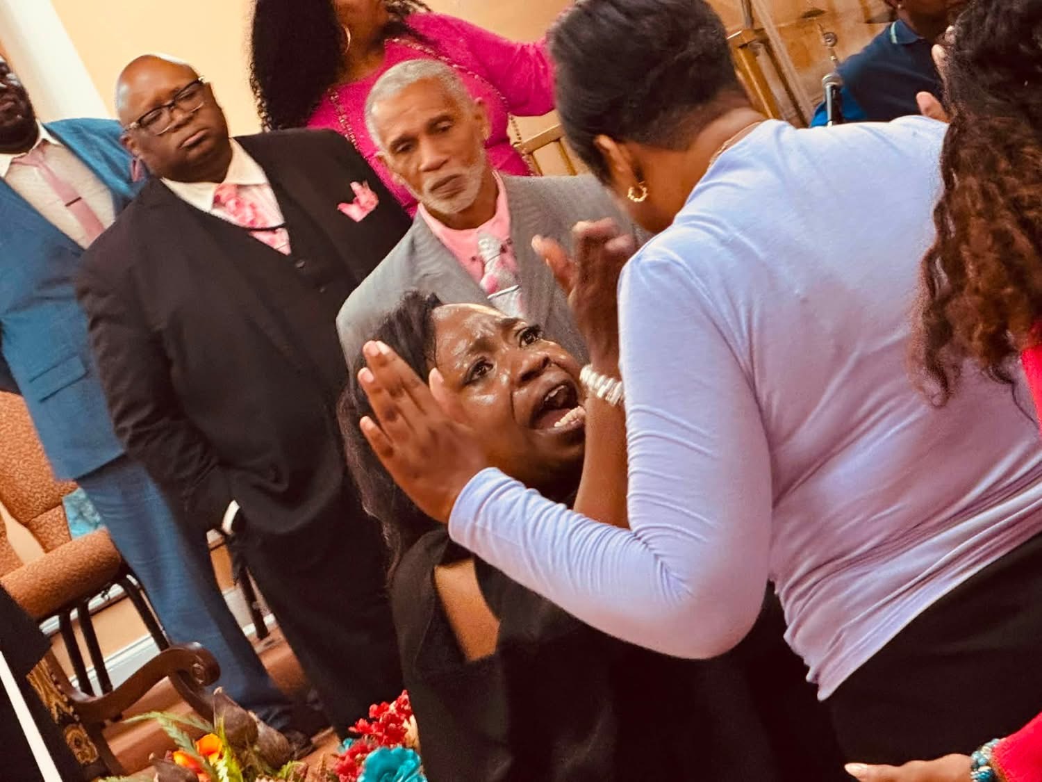 Prayer and encouragement during service