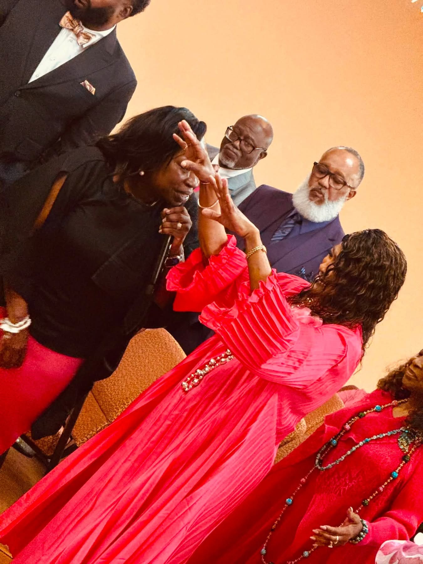 Evangelist Teresa ministering during prayer